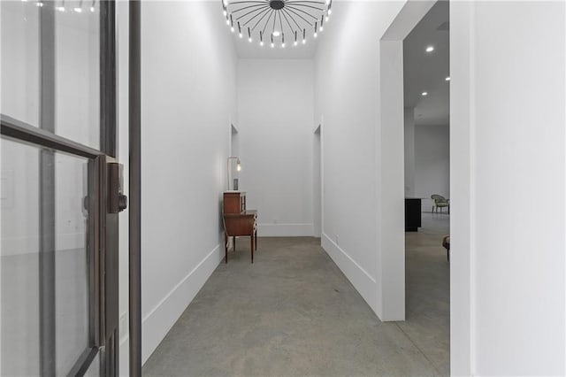 538 Main St, Palmetto, GA 30268 - hall featuring concrete floors and a towering ceiling