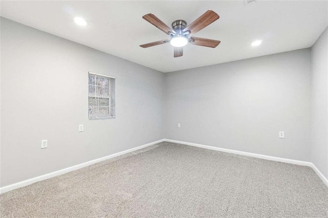 carpeted empty room with recessed lighting, baseboards, and ceiling fan