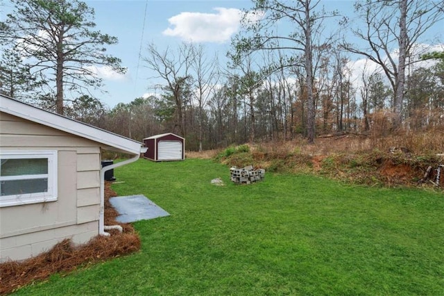 view of yard with an outbuilding and a storage shed