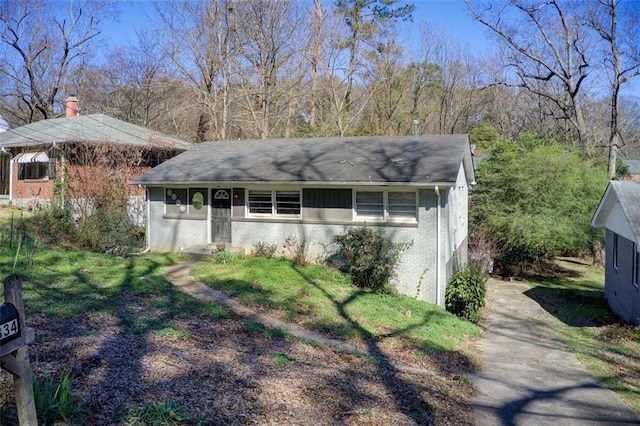 view of front of home featuring brick siding