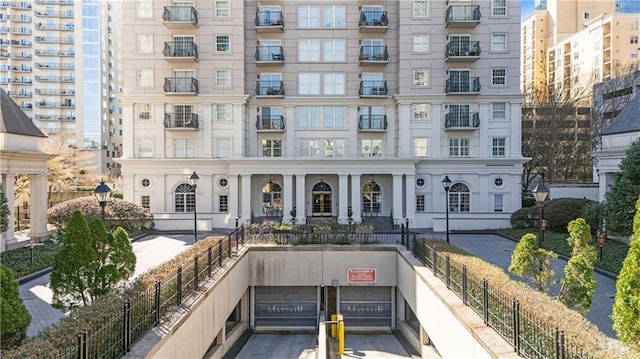 view of building exterior featuring fence