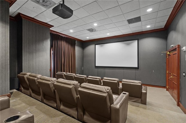 carpeted cinema room featuring visible vents, recessed lighting, and crown molding