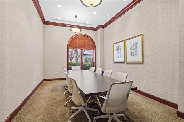 dining area featuring baseboards, carpet, crown molding, and wallpapered walls