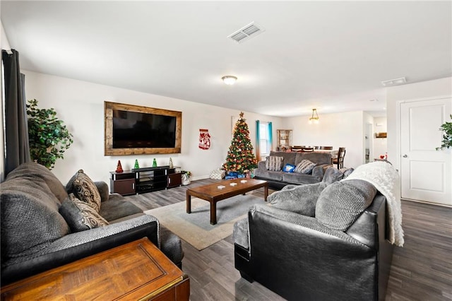 living room featuring dark hardwood / wood-style floors