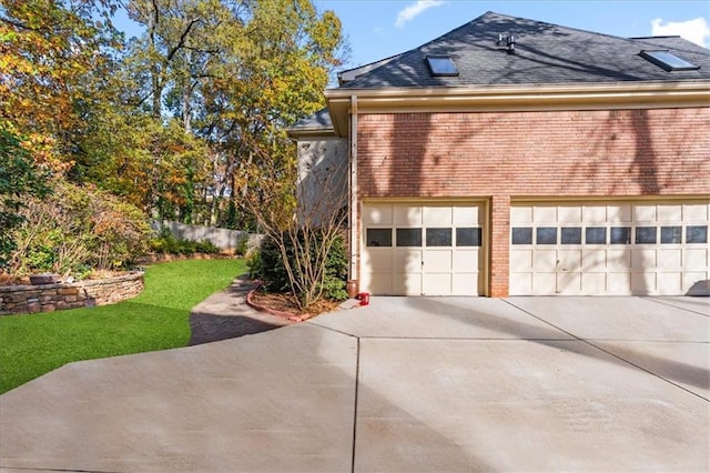 view of property exterior with a garage