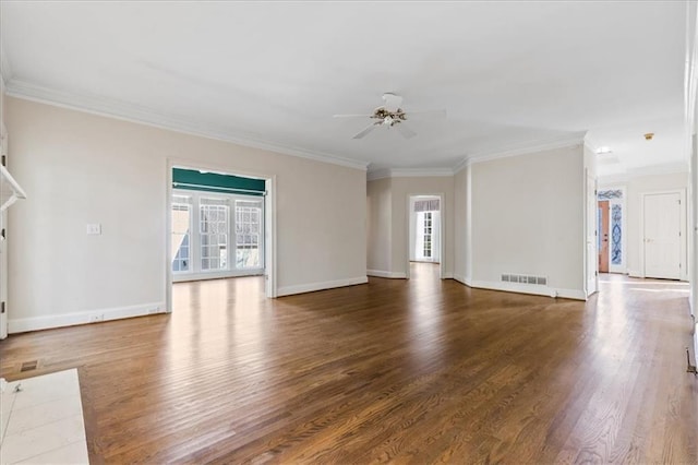 unfurnished living room featuring dark hardwood / wood-style flooring, ceiling fan, and ornamental molding