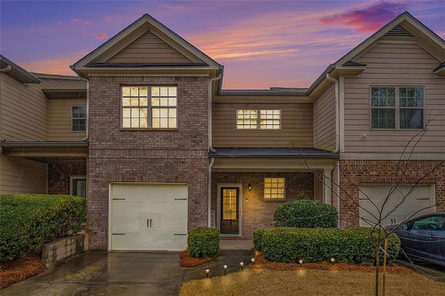 view of front of home with a garage