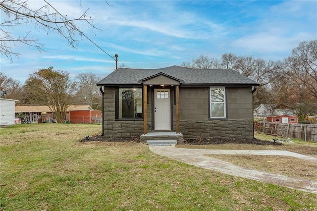 bungalow with a front lawn