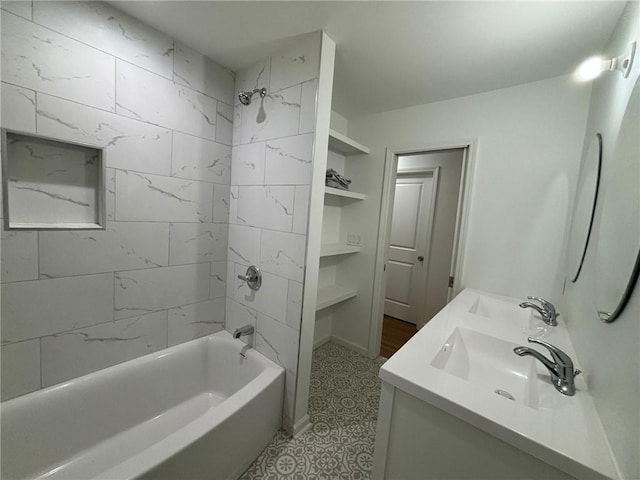 full bath featuring vanity and  shower combination