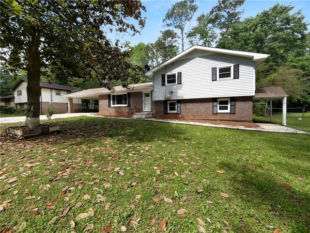 6389 Cumberland Dr, Rex, GA 30273 - tri-level home featuring brick siding, a front lawn, and a patio