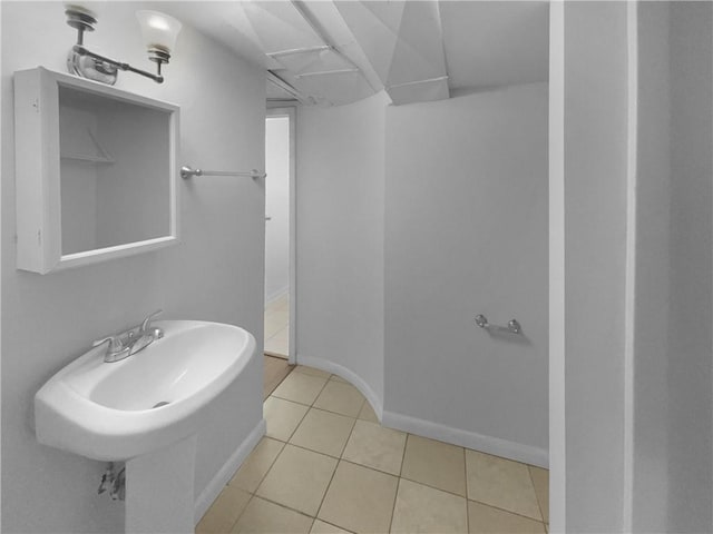 6389 Cumberland Dr, Rex, GA 30273 - bathroom featuring tile patterned floors and baseboards