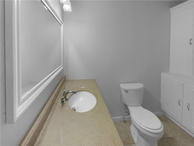6389 Cumberland Dr, Rex, GA 30273 - half bath with toilet, tile patterned flooring, and vanity