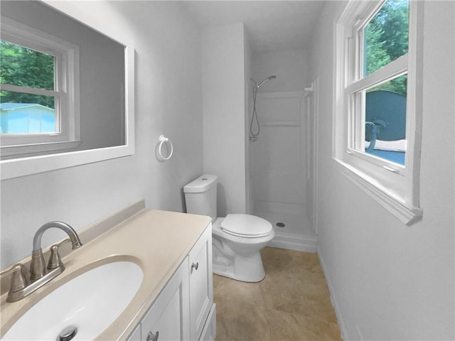 6389 Cumberland Dr, Rex, GA 30273 - bathroom featuring a shower, vanity, toilet, and baseboards