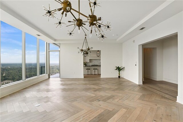 3630 Peachtree Rd NE Unit 3302, Atlanta, GA 30326 - interior space with baseboards, coffered ceiling, beam ceiling, and a chandelier