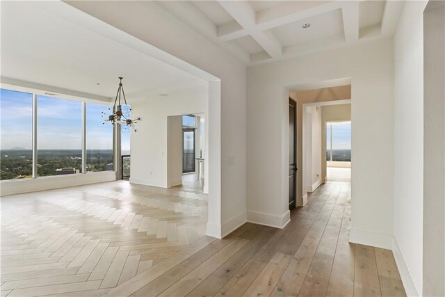 3630 Peachtree Rd NE Unit 3302, Atlanta, GA 30326 - hall with baseboards, coffered ceiling, beam ceiling, and a wealth of natural light