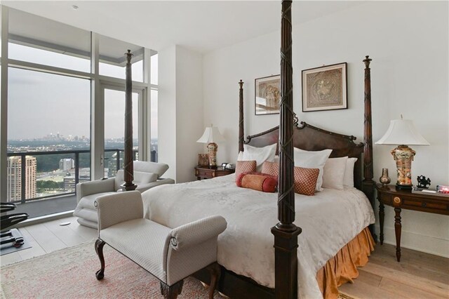 3630 Peachtree Rd NE Unit 3302, Atlanta, GA 30326 - unfurnished room with visible vents, floor to ceiling windows, baseboards, and light wood-style floors