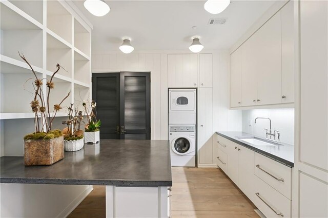 3630 Peachtree Rd NE Unit 3302, Atlanta, GA 30326 - bedroom with access to outside, a notable chandelier, floor to ceiling windows, and light wood-style flooring