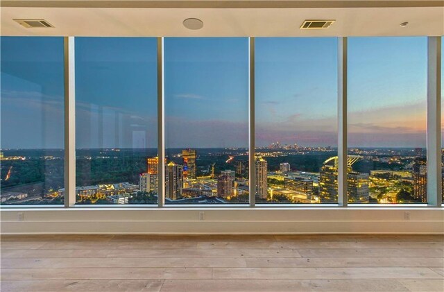 3630 Peachtree Rd NE Unit 3302, Atlanta, GA 30326 - full bathroom with tile walls, tiled shower, tile patterned flooring, and vanity