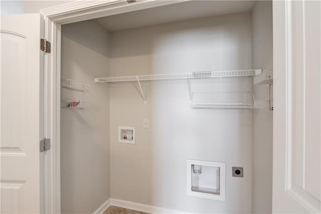 clothes washing area featuring hookup for an electric dryer, laundry area, baseboards, and hookup for a washing machine