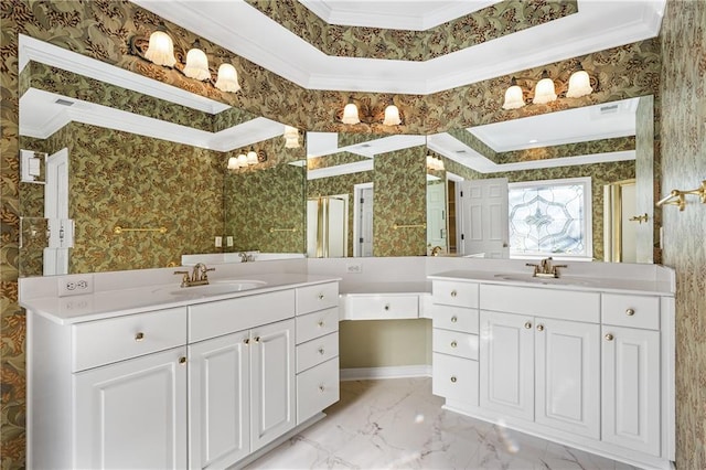 bathroom with vanity and ornamental molding