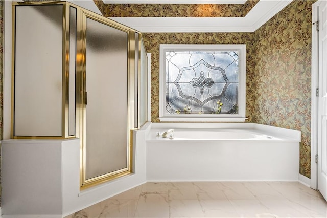 bathroom featuring crown molding and independent shower and bath