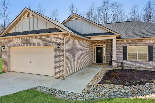 ranch-style home featuring board and batten siding, concrete driveway, an attached garage, a shingled roof, and brick siding