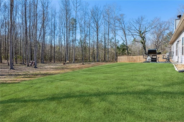 view of yard with fence