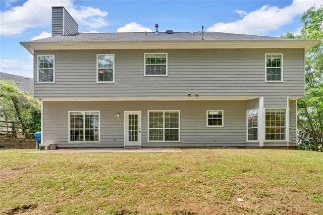 5705 Cannonero Dr, Alpharetta, GA 30005 - kitchen with appliances with stainless steel finishes, dark countertops, open floor plan, light wood-style flooring, and a chandelier