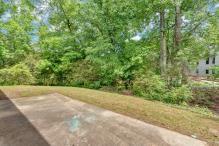 5705 Cannonero Dr, Alpharetta, GA 30005 - empty room featuring a tray ceiling, ceiling fan, light wood-style flooring, and ornamental molding