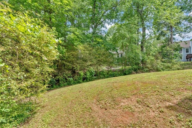 5705 Cannonero Dr, Alpharetta, GA 30005 - bathroom with a soaking tub, a shower, and vaulted ceiling
