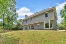 5705 Cannonero Dr, Alpharetta, GA 30005 - spare room featuring wood finished floors and a ceiling fan