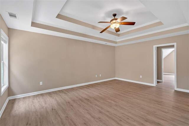 5705 Cannonero Dr, Alpharetta, GA 30005 - kitchen with stainless steel appliances, light wood finished floors, backsplash, a peninsula, and white cabinets