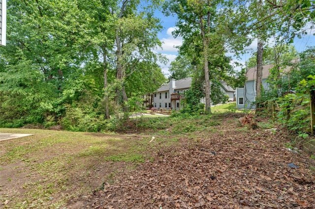 5705 Cannonero Dr, Alpharetta, GA 30005 - empty room with ceiling fan and wood finished floors
