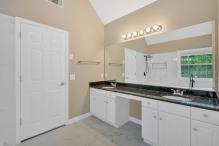 5705 Cannonero Dr, Alpharetta, GA 30005 - unfurnished room featuring a raised ceiling, a ceiling fan, wood finished floors, crown molding, and healthy amount of natural light