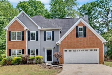 5705 Cannonero Dr, Alpharetta, GA 30005 - unfurnished room featuring a ceiling fan, wood finished floors, and a textured ceiling