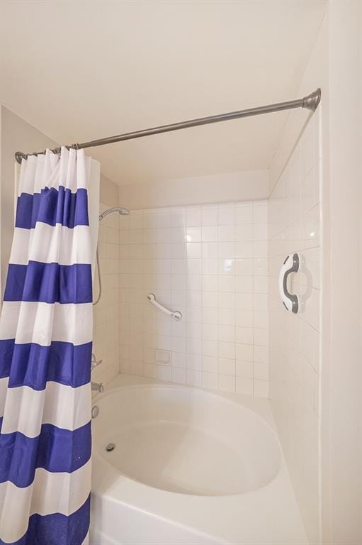 bathroom featuring shower / bath combination with curtain