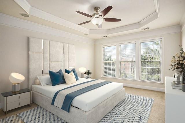 carpeted bedroom with crown molding, ceiling fan, and a raised ceiling