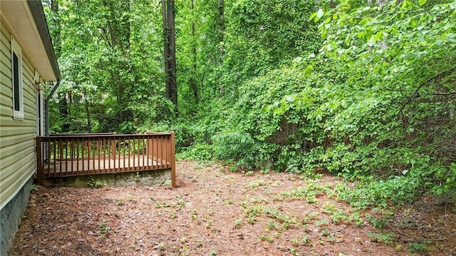 view of yard featuring a deck
