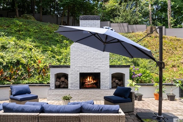 4070 Whitewater Creek Rd, Atlanta, GA 30327 - view of patio with an outdoor living space with a fireplace