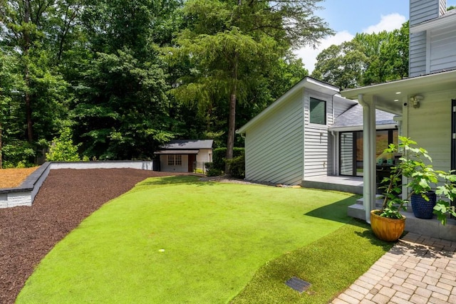 4070 Whitewater Creek Rd, Atlanta, GA 30327 - view of grassy yard featuring an outdoor structure