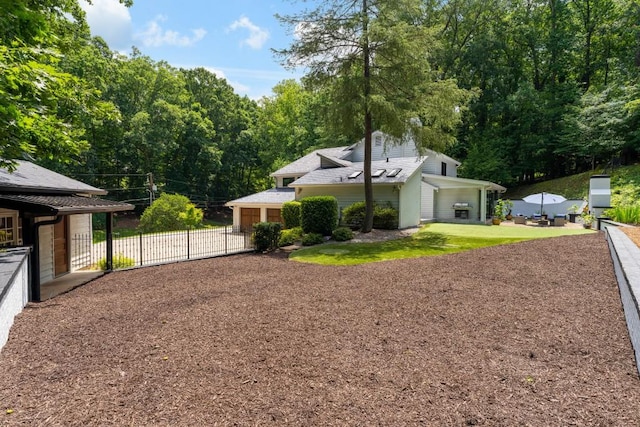 4070 Whitewater Creek Rd, Atlanta, GA 30327 - view of property exterior featuring driveway and a garage
