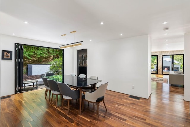 4070 Whitewater Creek Rd, Atlanta, GA 30327 - dining area with hardwood / wood-style floors, recessed lighting, and healthy amount of natural light