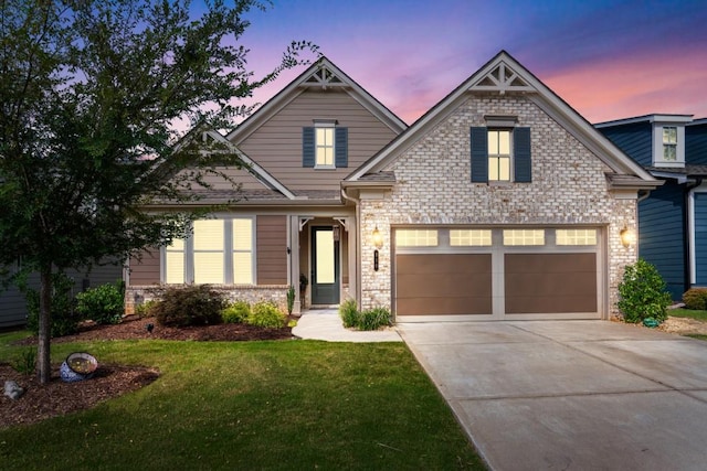 310 Chatuge Dr, Hoschton, GA 30548 - view of front of house with driveway, a front yard, and an attached garage