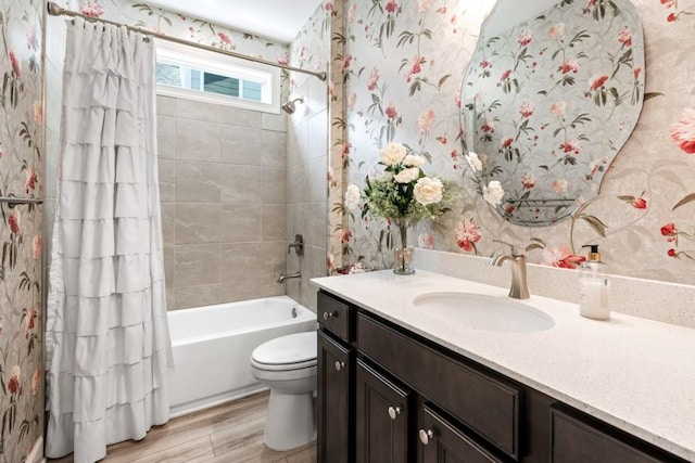 310 Chatuge Dr, Hoschton, GA 30548 - bathroom with wallpapered walls, vanity, toilet, shower / tub combo with curtain, and wood finished floors