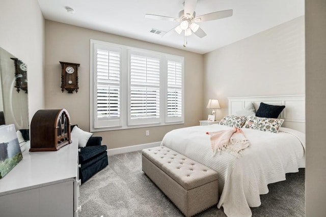 310 Chatuge Dr, Hoschton, GA 30548 - carpeted bedroom with ceiling fan and baseboards