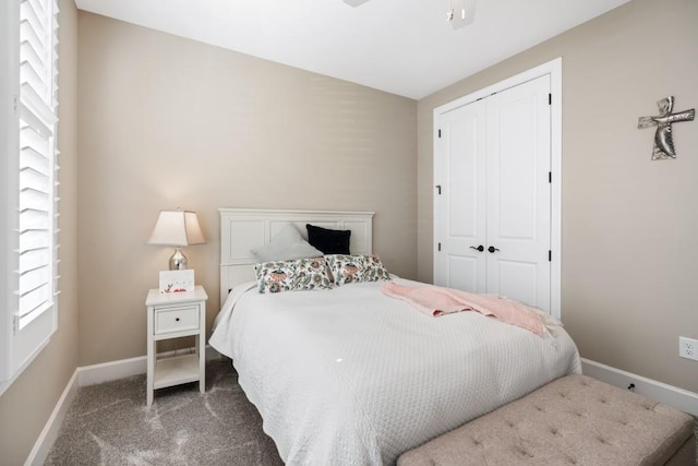 310 Chatuge Dr, Hoschton, GA 30548 - carpeted bedroom featuring a closet and baseboards