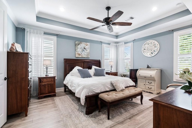 310 Chatuge Dr, Hoschton, GA 30548 - bedroom with a raised ceiling, light wood-style flooring, baseboards, a ceiling fan, and recessed lighting