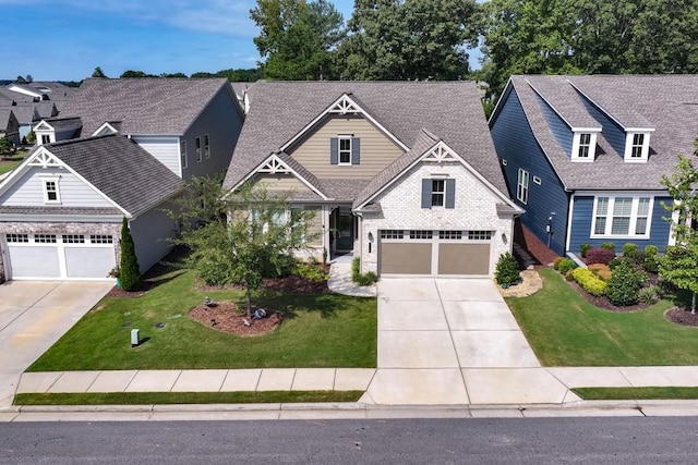 310 Chatuge Dr, Hoschton, GA 30548 - craftsman-style home featuring driveway, a front lawn, and a residential view