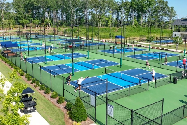 310 Chatuge Dr, Hoschton, GA 30548 - view of tennis court featuring view of wooded area