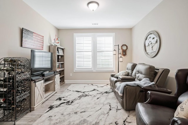 310 Chatuge Dr, Hoschton, GA 30548 - living room featuring light wood-style floors and baseboards